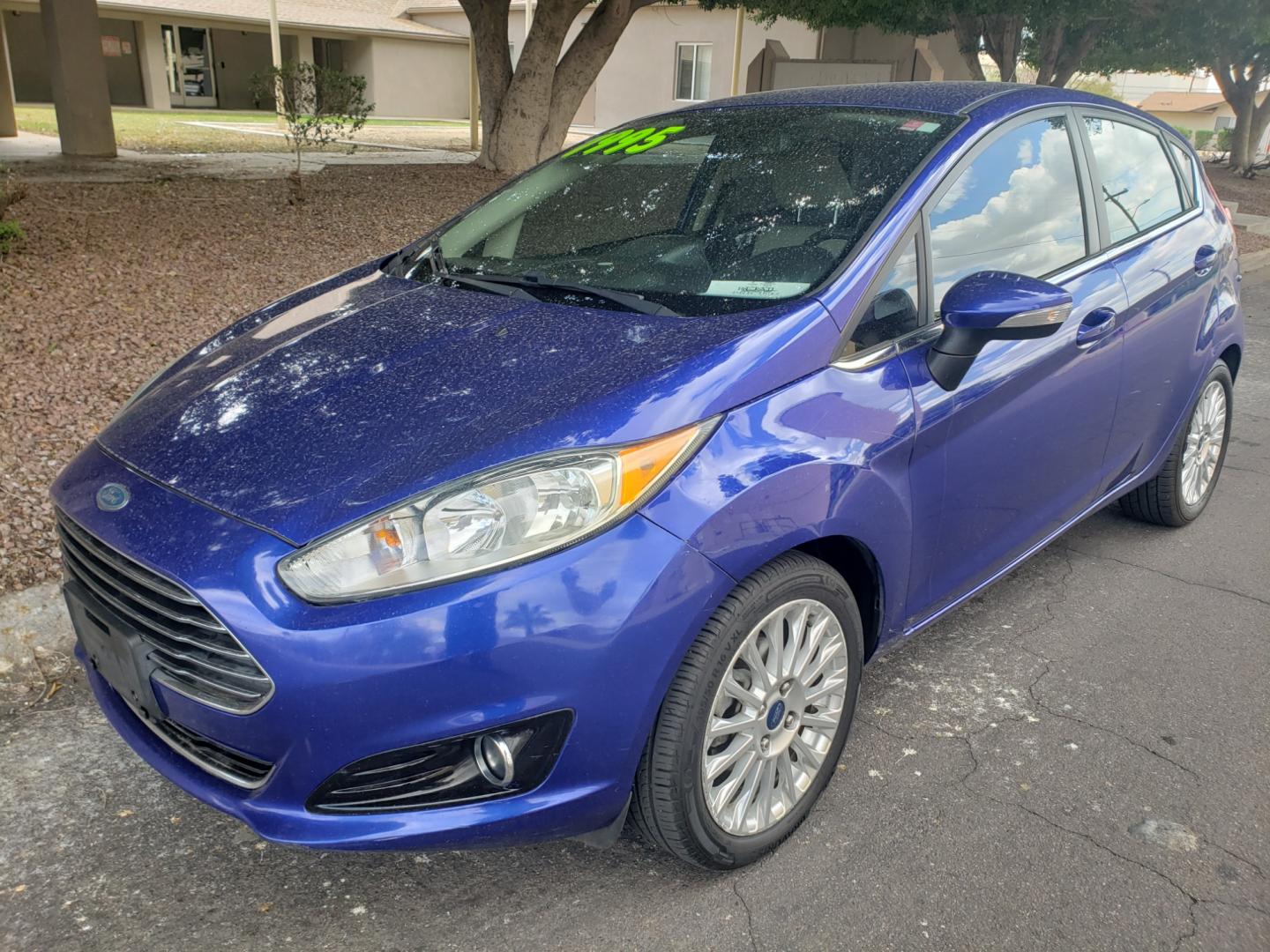 2014 /Tan and black Ford Fiesta Titanium (3FADP4FJ5EM) with an 1.6l i4 engine, 6-Speed Automatic transmission, located at 323 E Dunlap Ave., Phoenix, AZ, 85020, (602) 331-9000, 33.567677, -112.069000 - 2014 Ford Fiesta Titanium,.......A Must See!!... No accidents, Only 95K MILES.... Ice cold AC. The car is gorgeous inside and out. Power windows, Power door locks, Touch screen Stereo/ CD Player, Phone sync, Bluetooth, Satellite compatible, Backup camera, Beautiful tan and black interior with tan le - Photo#0
